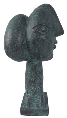 statue of a man ' s head on a pedestal with a white background