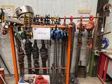 a room with a bunch of chains and tools in it