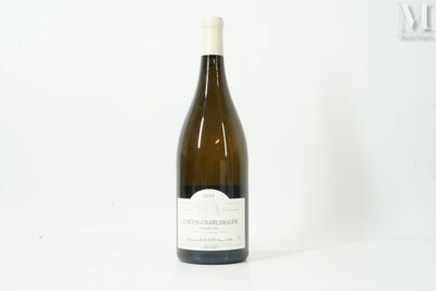 a bottle of wine that is sitting on a table