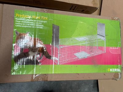 a cardboard box with a picture of a cat inside of it
