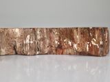 a piece of wood that is sitting on a table