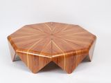an image of a wooden coffee table with a starburst design