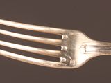 a fork that is sitting on top of a plate