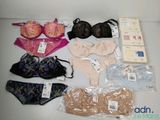 a lot of bras and underwear that are on the table