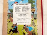 an old children ' s book with a picture of a man and a dog on it