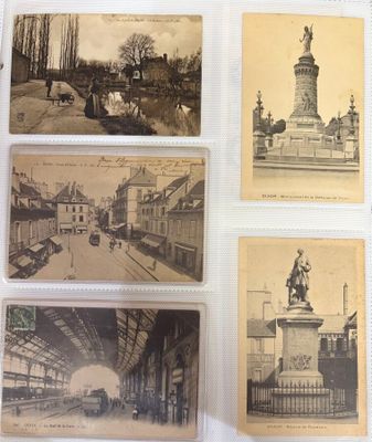several old postcards of a city with a statue in the middle
