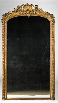 an antique gold framed mirror on a white background