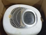 a box that has a fan inside of it