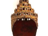 an image of a gold crown on a white background