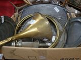 a box full of pots and pans with a brass horn