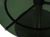 an image of a glass table with a clock on it
