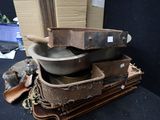 a pile of pots and pans sitting on a table