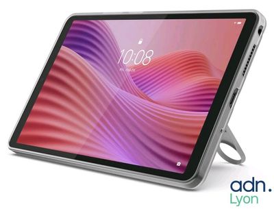 a close up of a tablet with a pen on top of it
