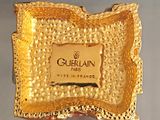 a gold plate that has a label on it