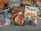 a lot of comic books on the table