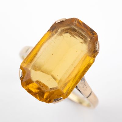 an image of a ring with a large citrine stone in it