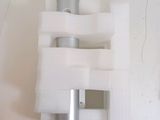 a white toilet paper roll and a toilet paper roll on a toilet paper holder