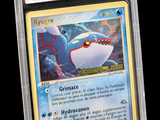 a close up of a pokemon card in a plastic case