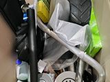 a cardboard box filled with assorted items and tools