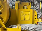 a close up of a machine that is in a factory