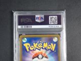 a close up of a pokemon card in a plastic case