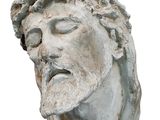 une statue représentant un homme portant une couronne d'épines sur la tête