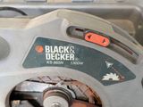 a black and decker electric circular saw in a box