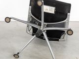 an image of a chair with wheels and a black seat