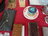 many different types of purses laid out on a table