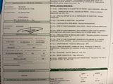 une feuille de papier sur laquelle figure la photo d'une personne