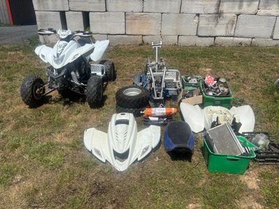 many different types of atvs that are on the grass