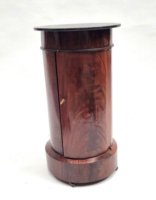 a small wooden table with a black top on a white background