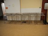 a row of tables in the middle of a room