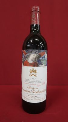a bottle of wine that is sitting on a table