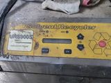a picture of a machine that is sitting on the ground
