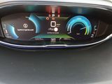 the dashboard of a car with a digital display on it