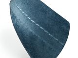 un objet bleu posé sur une surface blanche