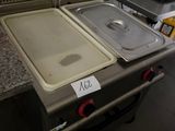 an image of a kitchen with a stove and a sink
