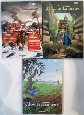four children ' s books on a white surface with a red train in the background