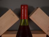a bottle of wine that is sitting on a table