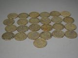 a lot of coins that are on the table