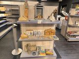 a display of religious items on the shelves in a store