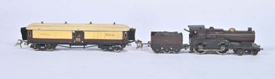 deux petits trains miniatures posés sur une surface blanche