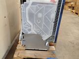 a picture of a refrigerator sitting on a pallet in a warehouse