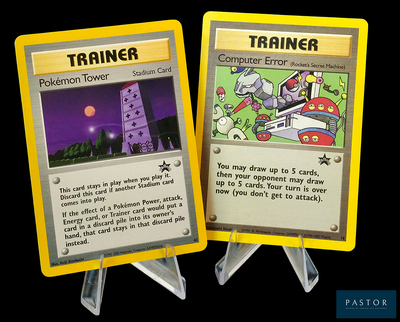 deux cartes Pokémon sur lesquelles figure une tour en arrière-plan