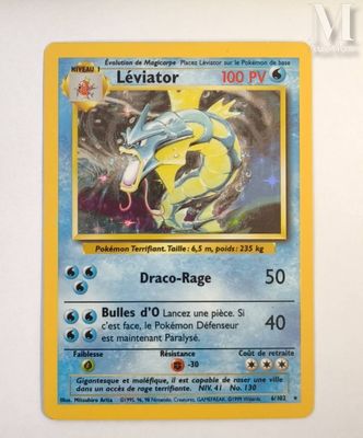 a pokemon card with a picture of a dragon on it