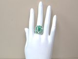 a hand with a ring on it that is on a mannequin
