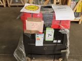 a stack of luggage sitting on top of a cart in a warehouse