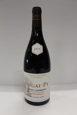 a bottle of wine that is sitting on a table