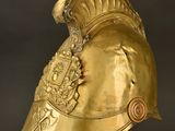 helmet of a roman soldier with a crest on the side